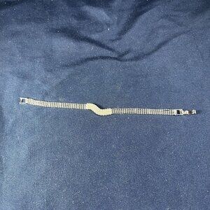 Silver Rhinestone Bracelet With Wavy Centerpiece & Secure Clasp